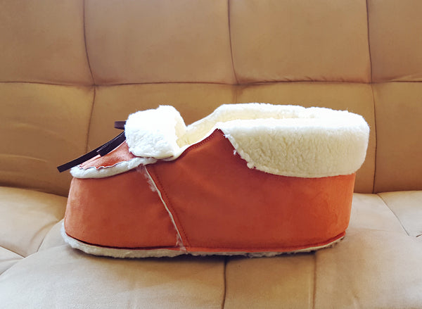 side view of orange moccasin bed