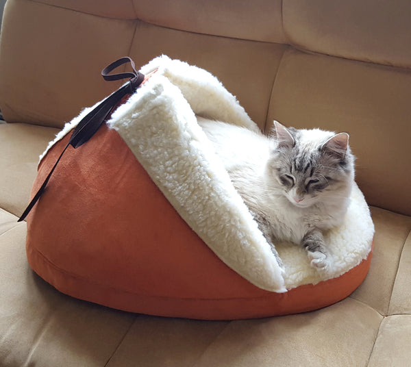 Slipper Pet Bed side view with a cat in it